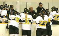 Gustavus talks strategy during a timeout.