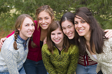 The 2006 Gusatvus Lucia Court (l to r) Gretchen Libbey, Hannah Wunsch, Kristin Mummert, Holly Andersen, and Delphine Broccard.