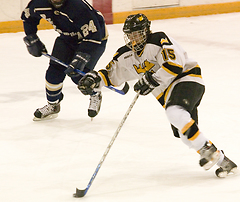 Ben Olilla rushes the puck up the ice for the Gusties.