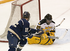 Kevin Johnson comes up with one of his 22 saves on the night.