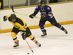 Sami Idris skates down a loose puck.