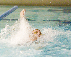 Scott Hagemeyer set a new pool record in the 100 backstroke.