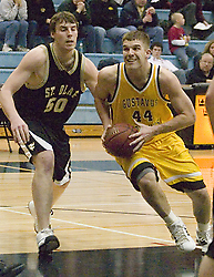 Phil Sowden drives the lane against the Oles.