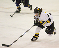 Mari Gunderson drives toward the net.