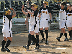Gusties celebrate Mahre's record breaking home run in the third inning of game one.