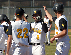 Pat Siering celebrates after hitting a grand slam home run in the second game.