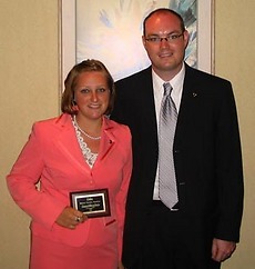 Gustavus senior Andrea Carlile and Communication Studies instructor Kristofer Kracht.