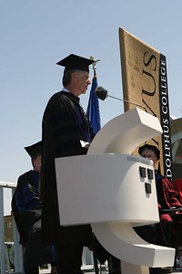 Claude Brew accepts the Edgar M. Carlson Award