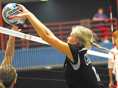 Jen Thelemann stuffs a Buena Vista attack.