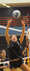 Bridget Burtzel puts up a set for the Gustie attack.