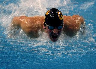 Junior Will Sutor powers his way to victory in the 100 butterfly.