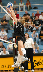 Meghan Gehring and Britta Bolm going up for a block.