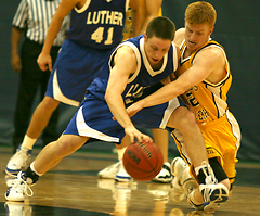 Mike DesLauriers battles a Luther player for possession of the ball.