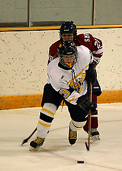 Stefanie Ubl fights off a Saint Mary's defender.