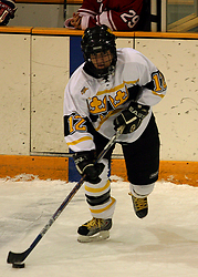 Jessie Doig looks to put the puck into the Saint Mary's zone.