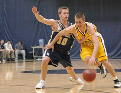 Trevor Wittwer dribbles past a Royal defender.