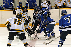 The Gusties and Sabres face-off at center ice.