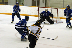 Jay Fifield sends a shot on net during the Gusties 5-on-3 power play in the second period.