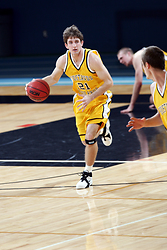 Sophomore guard Jesse Van Sickle starts the fast break. (Brian Fowler photo)