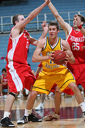 Senior post Trevor Wittwer is surrounded by a couple of Saint Mary's defenders on the block. (Brian Fowler photo)