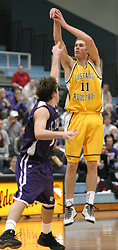 Trevor Wittwer pulls up for a long jump shot.