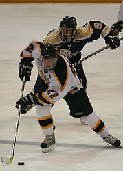 Tim Ornell pushes the puck up the ice.