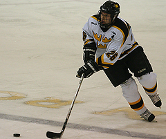 Niko Suoraniemi carries the puck over the Gustie blueline.