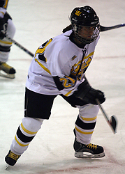 Sara Yungner steps up to play the puck.