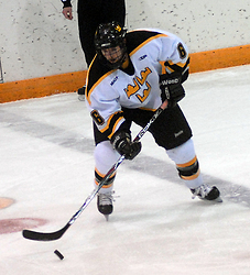 Senior defenseman Cody Mosbeck handles the puck on the power play.