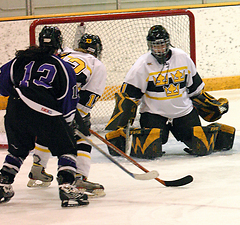 Breanna Scavo makes one of her 11 saves.