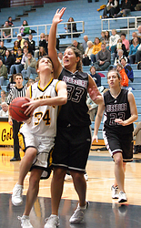 Molly Mathiowetz tries to drive around Brietta Schleunder.