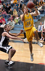 Dan Schmidtknecht breaks free for a lay-up.