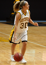 Emily Nelson looks to pass against St. Kate's.