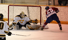 Josh Swartout slides across the crease to make a big save.