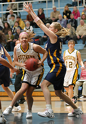 Vicky Peterson drives through the lane.