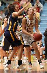 Katie Layman makes a move down in the paint.