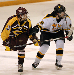 Mitch Carlson battles with Concordia's Kevin Torkelson for position.