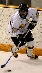 Molly Doyle plays the puck out of the corner.