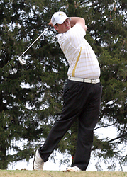 Mark Stuckey is tied for the individual lead after the first day.