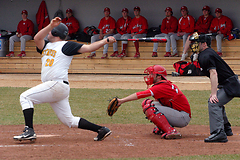 Shea Roehrkasse drives a ball to right field for a double in game one.