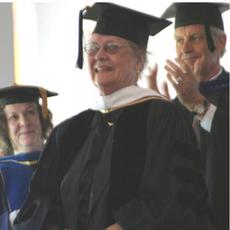Florence Sponberg (center) accepts her honorary degree during the welcoming service for the 2004 MAYDAY! Peace Conference.