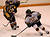 Rory Dynan pushes the puck up the ice.  Dynan registered three assists in the game.