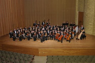 Conductor Warren Friesen & the Gustavus Symphony Orchestra