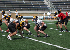 Quarterback Jordan Becker calls the play.