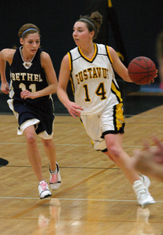Julia Schultz leads the break for Gustavus.