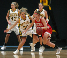 Emily Nelson puts defensive pressure on a St. Ben’s player.