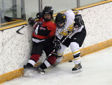 Alyssa Gaulrapp battles on the boards with Bailey Vikstrom of UW-River Falls.