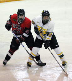 Allie Schwab battles for position with Amanda Ryder of UW-River Falls.