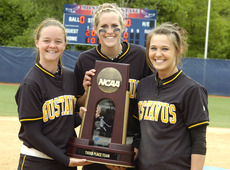 Seniors Jessie Gabbert, Rachael Click, and Emily Klein with trophy.