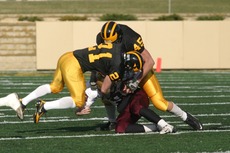 Welch making a tackle versus Concordia last season.
